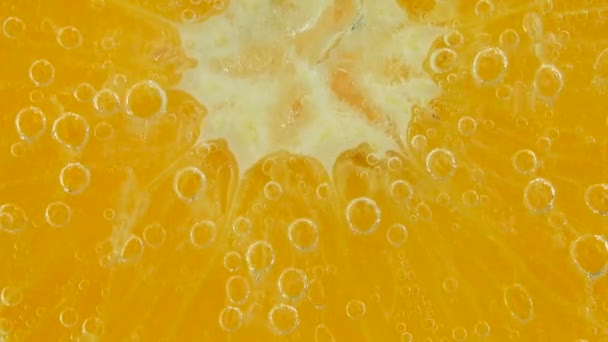 Air Bubbles Orange Slice — стоковое видео