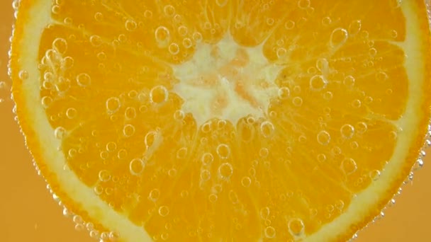 Air Bubbles Orange Slice — стоковое видео