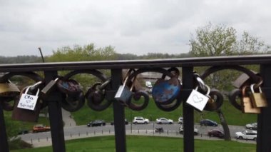 Warsaw, Poland. Dung Hill lookout point with top view of the Vistula river and love padlocks attached to the railing.
