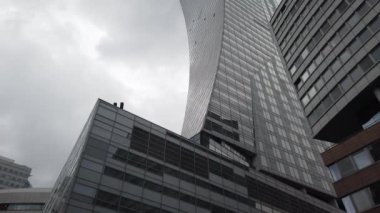 Warsaw, Poland. Skyscrapers in the Mirow district. It is a developing business environment, where modern skyscrapers, alternate with pre-war ruins and graffiti-painted Stalinist houses.