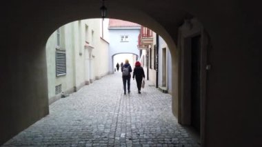 WARSAW, POLAND - APRIL 26, 2022: Popular tourist spot Arcade Gate in the Old Town of Warsaw.