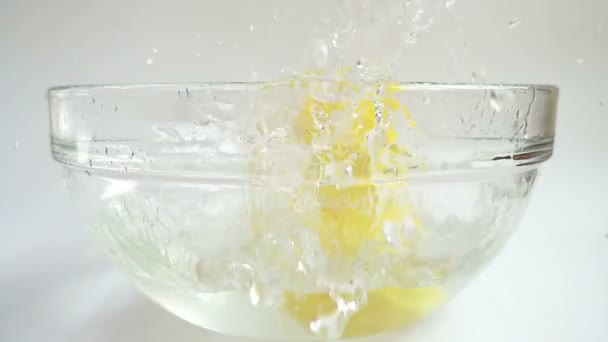 Falling Vegetables Onions Potatoes Carrots Bowl Water Slow Motion — Stock Video
