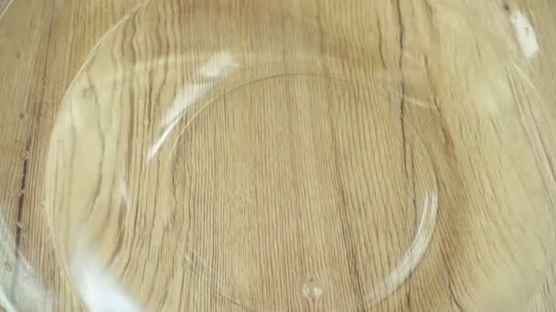 Falling Tomatoes Glass Bowl Water Slow Motion — Stockvideo