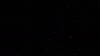 Siyah arka planda düşen bezelyeler..