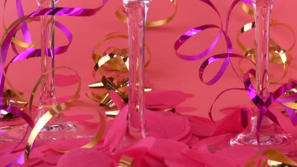 Pouring Sparkling Wine Glasses Pink Background Confetti Form Hearts Serpentine — Wideo stockowe