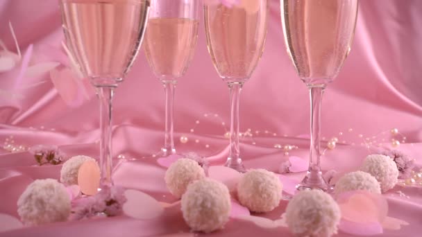 Falling Confetti Form Hearts Glasses Sparkling Wine Candy Coconut Flakes — Vídeo de Stock