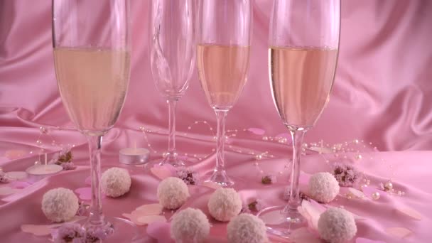 Pouring Sparkling Wine Glasses Candy Coconut Flakes Soft Pink Background — Wideo stockowe