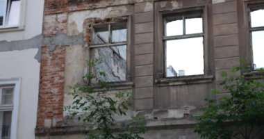 Ruins of an ancient building in a European city.