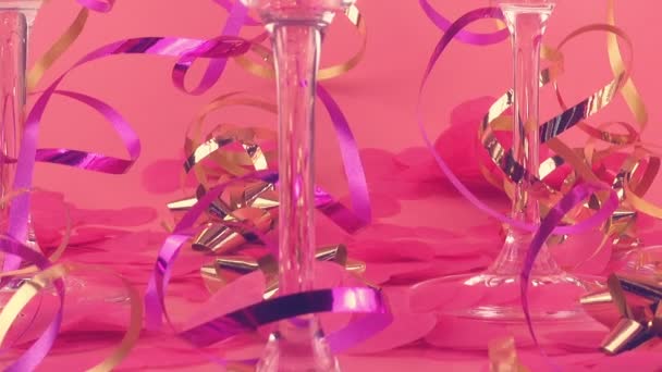Pouring Sparkling Wine Glasses Pink Background Confetti Form Hearts Serpentine — ストック動画