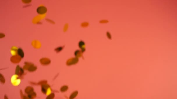 Falling Confetti Peach Pink Background Slow Motion — Vídeo de stock