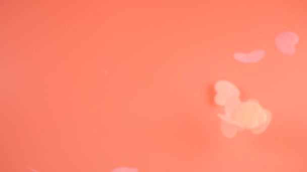 Falling Confetti Peach Pink Background Slow Motion — Stok video