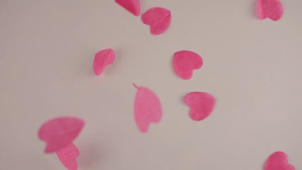 Falling Confetti White Background Slow Motion — Stockvideo