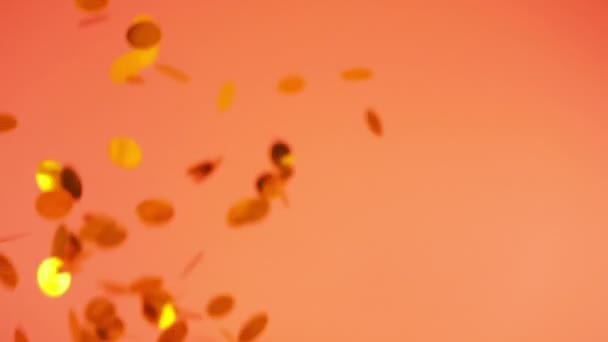 Falling Confetti Peach Pink Background Slow Motion — Vídeo de Stock