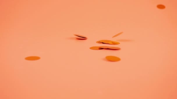 Falling Confetti Peach Pink Background Slow Motion — Vídeo de Stock