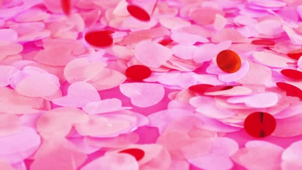 Falling Confetti Pink Background Slow Motion — Vídeos de Stock
