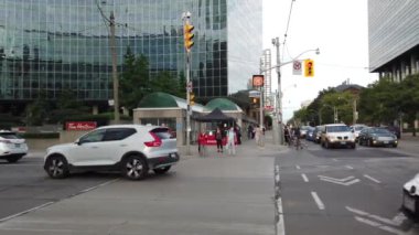 Skyscrapers, streets and pedestrian crossing in downtown Toronto, Ontario, Canada.