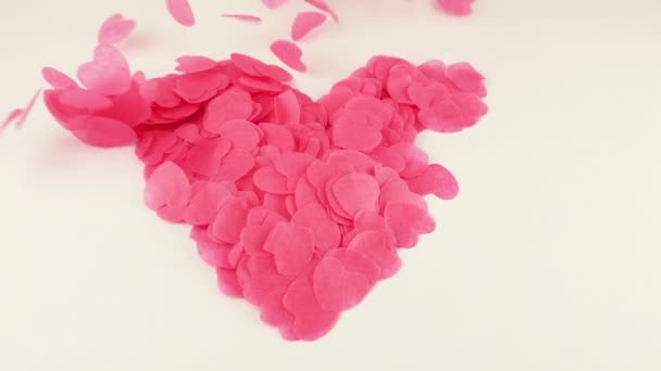 Heart Shaped Confetti Flies Wind Slow Motion — Stockvideo