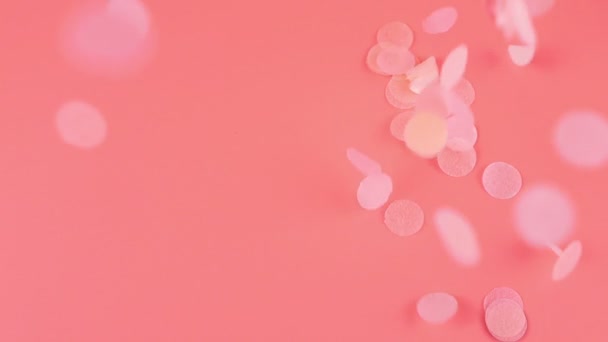 Falling Confetti Pink Background Slow Motion — Vídeo de Stock