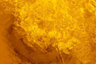 Bulanık sarı soyut arka plan yansıması kabarcıklar, üst görünüm, yatay