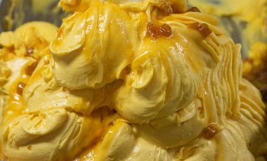 İştah açıcı sarı dondurmanın soyut arkaplanı, yatay