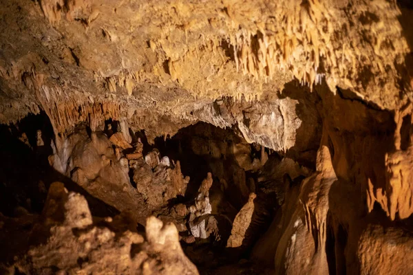 Blurred Warm Abstract Background Stalactites Stalagmites Stalagnates Sfendoni Cave Underground — Stock Photo, Image