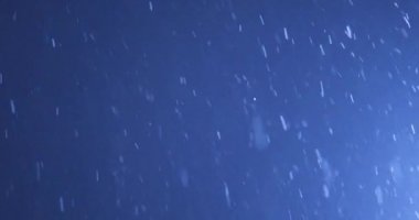 beautiful snowfall in the evening sky, christmas evening, new year winter