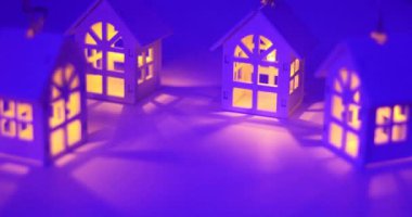 Financial loan and commercial real estate, real estate and investment concepts with model houses and slowly netting and fading windows inside