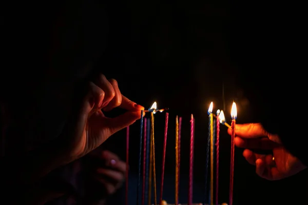 Light Candles Together Holiday Dark Horizontal — Stock Photo, Image
