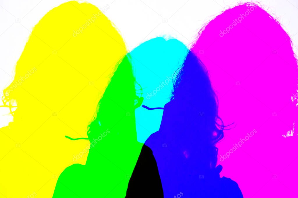 multi-colored silhouette of a girl with long hair on a white background. Concept backgroun