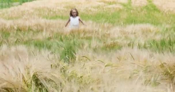 Little Girl White Long Curly Hair White Dress Runs Her — Stock video