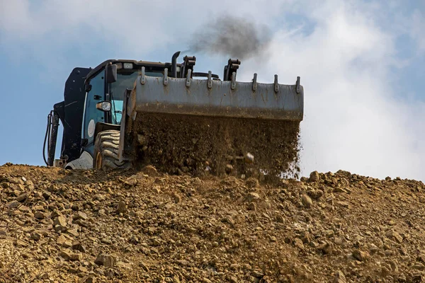 Tractor Large Bucket Soil Levels Road Sunny Hot Day Sky — 스톡 사진