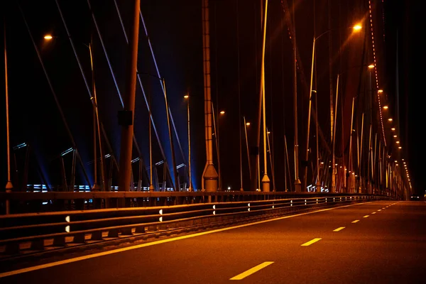 night toll automobile beautiful architectural bridge across the strait, horizontal