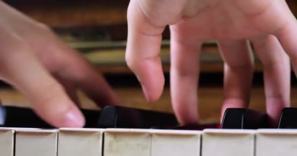 Little Pianist Plays Two Hands Piano Horizontal — Stock Video