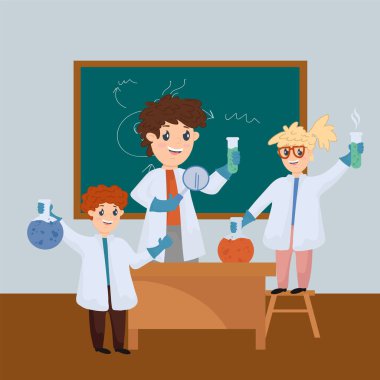 Okulda çocuklara ders vermek. Kimya sınıfındaki çocuklarla dolu bir laboratuvar. Öğretmen ev ödevine yardım ediyor. Çocuklar için bilim. Öğrencilerin olduğu güzel bir sınıf..