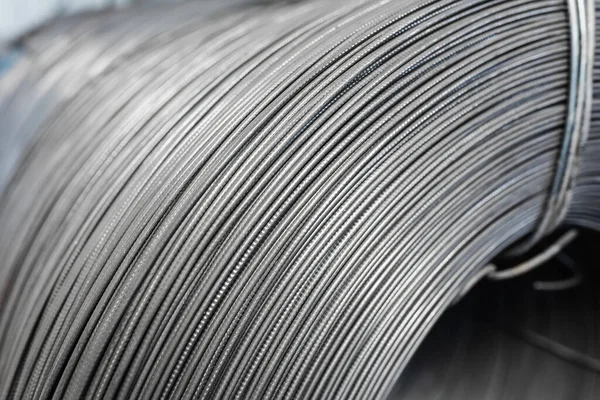 Iron wire in roll. Warehouse of metal products.