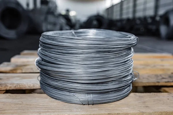 Iron wire in roll. Warehouse of metal products.