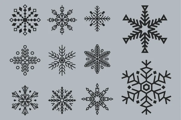 Copos de nieve garabato dibujado a mano para el diseño de Navidad. — Archivo Imágenes Vectoriales