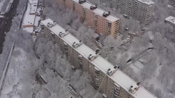 A winter cityscape after a snowfall. View of the sleeping area of Moscow in winter after snowfall. Aerial view — Stock Video