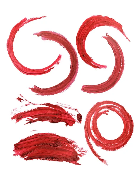 Traço de maquiagem de batom vermelho no fundo branco — Fotografia de Stock