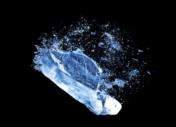 Collision explosion of blue ice on black background