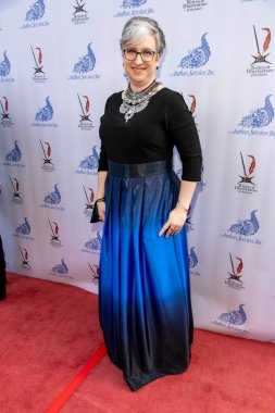 Madolyn Locke, 22 Ekim 2021 tarihinde Los Angeles 'taki Taglyan Kompleksi' nde düzenlenen 36. ve 37. Yıllık L. Ron Hubbard Başarı Ödülleri Galasına katılmaktadır.