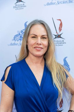 Christy Oldham, 22 Ekim 2021 tarihinde Los Angeles 'taki Taglyan Kompleksi' nde düzenlenen 36. ve 37. Yıllık L. Ron Hubbard Başarı Ödülleri Galasına katılmıştır.