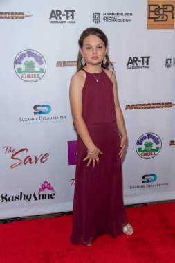 Daisie Reed 25 Mart 2022 tarihinde Universal Hilton, Universal City 'de Suzanne DeLaurentiis Prodüksiyon' a katılıyor ve 94. Oscar 'ını kutluyor.