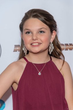 Daisie Reed 25 Mart 2022 tarihinde Universal Hilton, Universal City 'de Suzanne DeLaurentiis Prodüksiyon' a katılıyor ve 94. Oscar 'ını kutluyor.