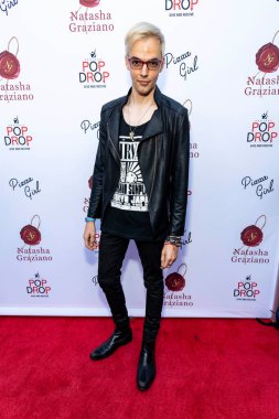 Ilia Yordanov attends Natasha Graziano's book launch party 