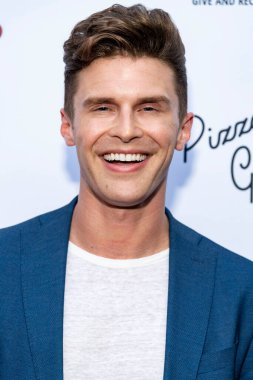 James Besteman attends Natasha Graziano's book launch party 