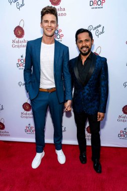 James Besteman, Joel Relampagos attend Natasha Graziano's book launch party 