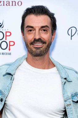 Todd Savvas attends Natasha Graziano's book launch party 