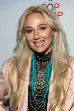 Celine LeSage attends Natasha Graziano's book launch party 