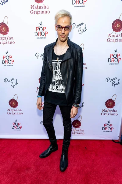 Ilia Yordanov attends Natasha Graziano's book launch party 